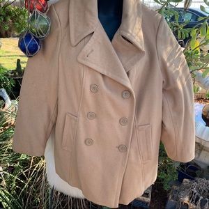 Woman within pea coat